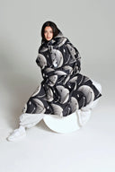 Rain Kiss Half Moon Smiley Rain Poncho In Black/Sand