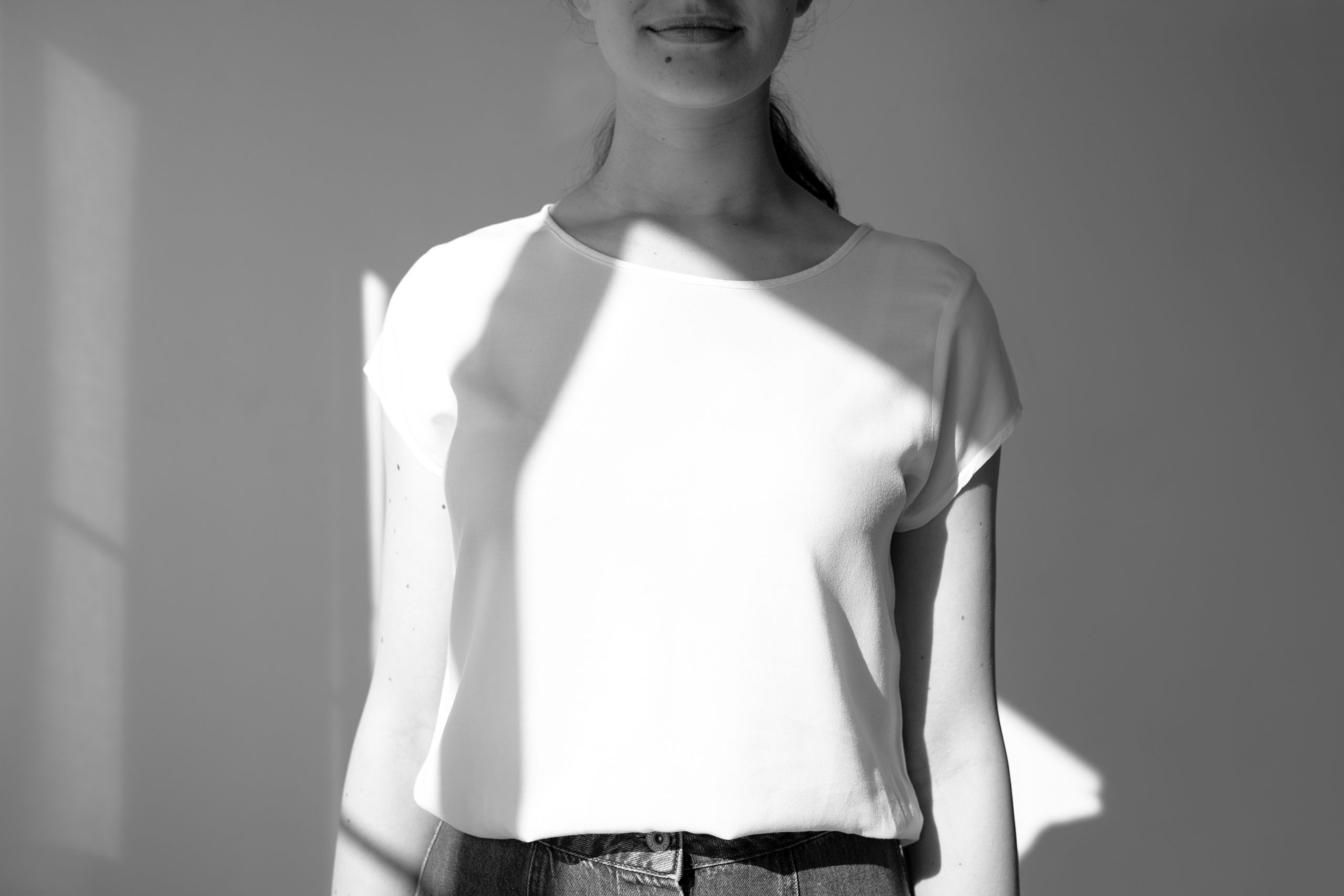 model wearing a white t-shirt